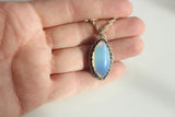 i used to live with ghosts Opalite Necklace